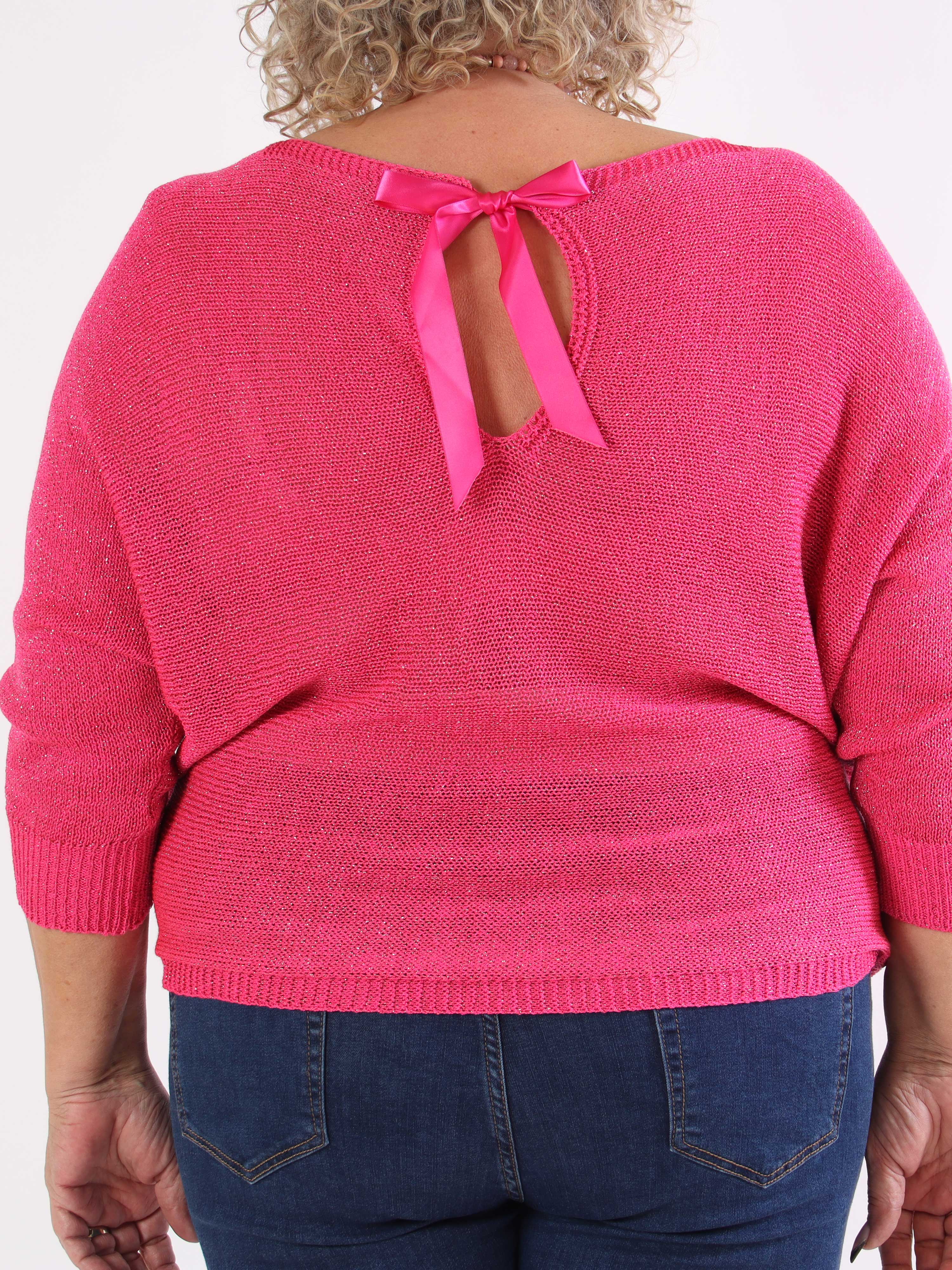 Paulina - Stickad blus i plus size med glittertrådar och rosett